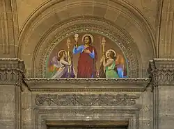 Fede (luneta del portal central).