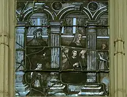 Vitral derecho de la capilla Santa Margarita (primera capilla lateral norte), con fecha de 1544, conocida como la «grisalla Berman» (presumiblemente procedente de la mansión de un donante y rico comerciante, Hanus Berman, que le representa con su familia y fue colocada en siglo&nbsp;XVII). Las grisalla son raras en Lorena, pero frecuentes en Champagne.