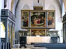 El retablo en la Iglesia de la ciudad de Wittenberg pintado por Lucas Cranach el Viejo y su hijo Lucas Cranach el Joven.