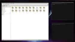 XMonad en modo mosaico con dos terminales URXVT y pcmanFM abierto
